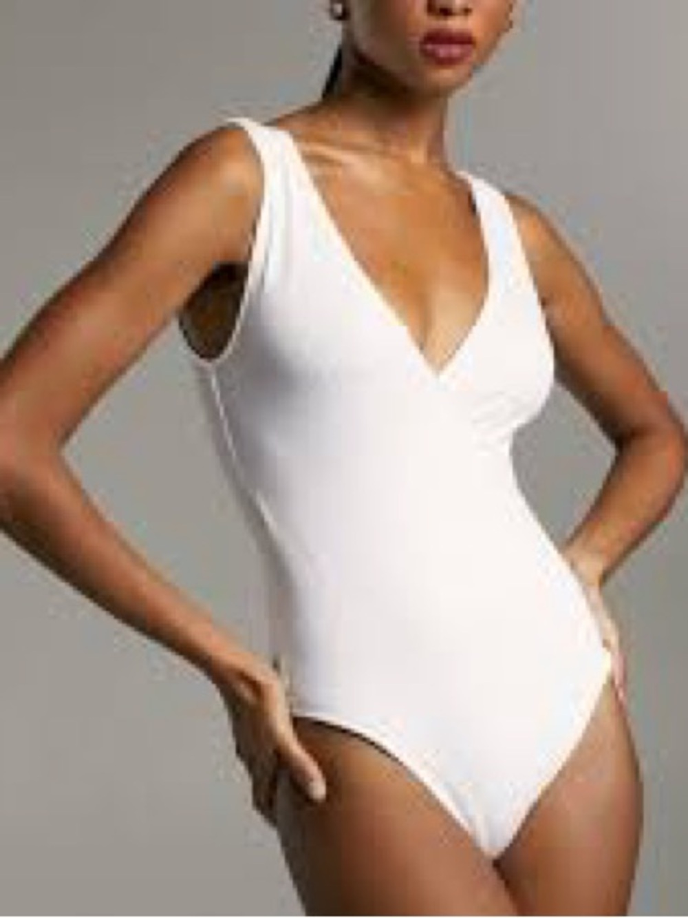 Babaton Elegant White V-Neck One-Piece thong bodysuit medium
